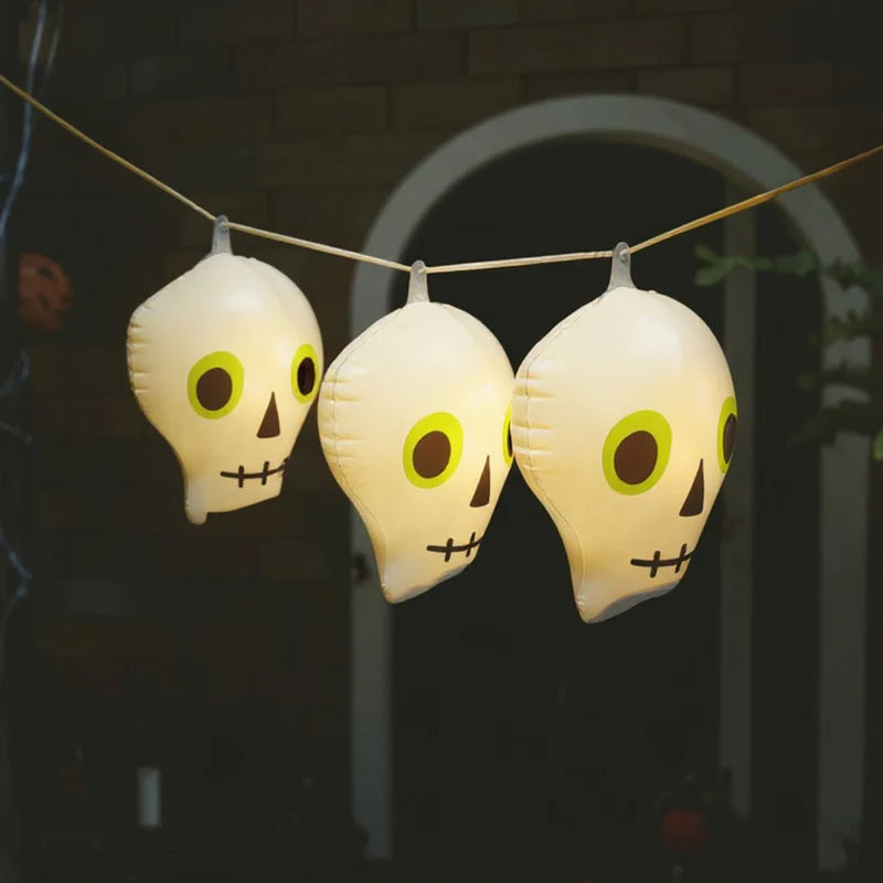 LIGHT UP HANGING SKULLS BONE
